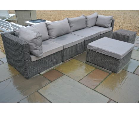 A secondhand Rattan Garden or Conservatory Sofa and two Stools with Cushions - in good condition - 330 cm wide in 4 x section