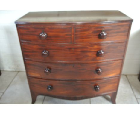 A 19th century mahogany bowfronted chest with two short over three long graduating drawers on splayed bracket feet - Height 1