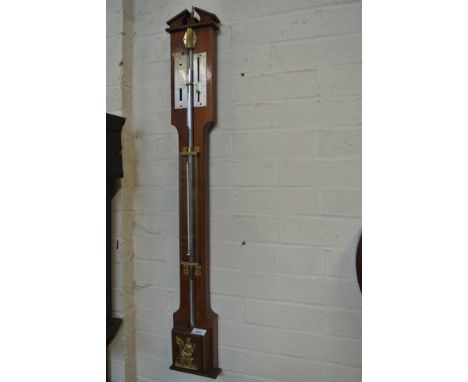 A 19th Century Continental stick barometer - mahogany with a thermometer and a glass tube filled with mercury - in working or