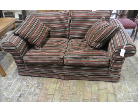 A good quality Two Seater Sofa - in good condition