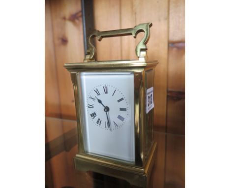 A Brass Carriage Clock - 13 cm tall - clean condition - working in saleroom