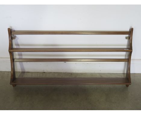 An Ercol Elm Wall Rack - 49 cm x 97 cm 