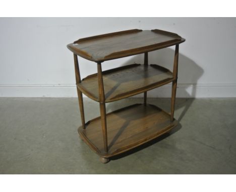 An Ercol Elm Three Tier Tea Trolley - 77 cm tall x 71 cm x 46 cm - in good condition