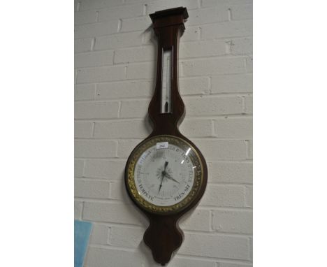 A 19th Century French barometer with a thermometer over a porcelain dial - signed Chevallier Paris - good condition - 93cm hi
