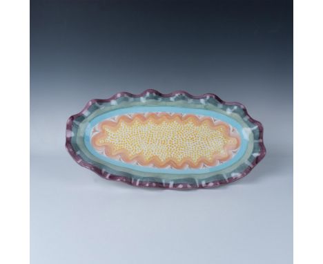 Beautiful oval ceramic tray with ruffled edges decorated in bright colors. Wire for hanging is attached. The back is stamped 