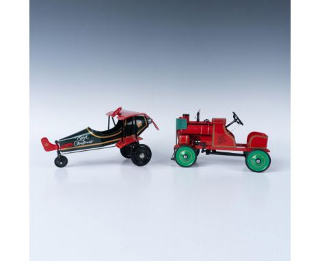 Miniature metal replica vehicles with movable parts. Hallmark backstamps. The Jingle Bell Express pedal car measures approxim