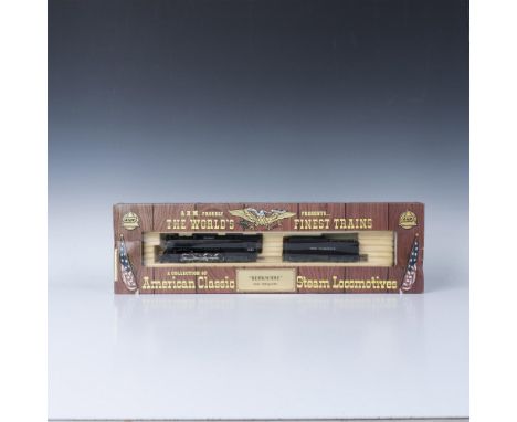 This is a HO scale model train, new in box, modeled after the Berkshire, Pere Marquette. This item has its original box with 