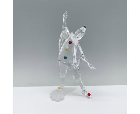 A jester figure striking an open-armed pose, complemented by green, red, and yellow crystals. Swarovski backstamp. This item 
