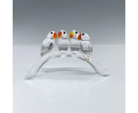 Four clear faceted crystal birds perched on a frosted arched branch. Fire opal crystal beaks. Swarovski backstamp. Artist: Ad