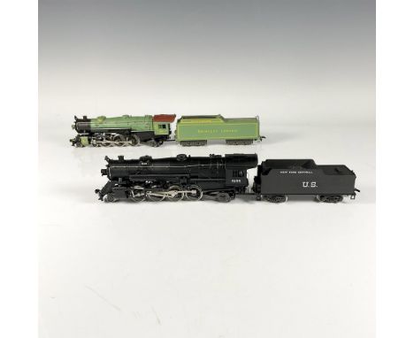 4 AHM train cars, a green locomotive and storage car for the Crescent Limited, and a black locomotive and storage car for the