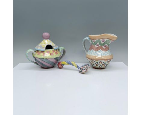 Pretty ceramic pieces decorated with unique patterns in pastel colors. Victoria and Richard MacKenzie-Childs backstamps on th