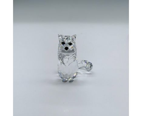 This retired figurine has a clear facetted crystal body and tail, with black eyes and nose. Swarovski acid stamp on the botto