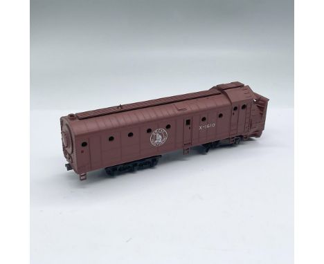 HO gauge model kit includes some parts and instructions. Features the Great Northern Rotary Snow Plow in brown color, made of