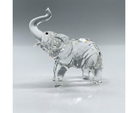 Adorable, faceted miniature crystal figurine modeled as a baby elephant. Swarovski acid marks. This item has its original box