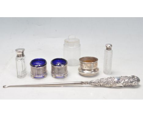 A collection of antique Victorian and later hallmarked sterling silver items comprising of silver topped jar, bearing hallmar