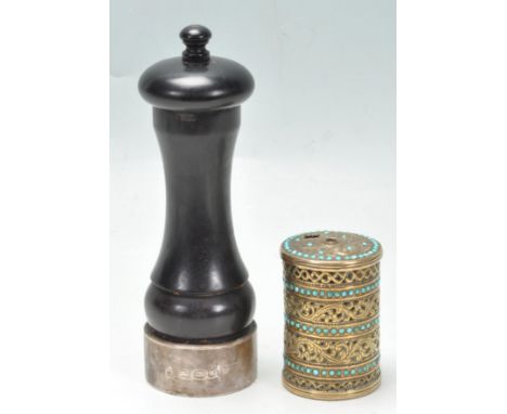 A silver collared M C Hersey &amp; Son Ltd pepper grinder constructed from ebonised wood with a silver collar to the base (ha