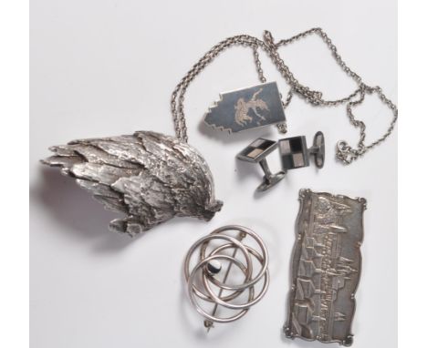 A collection of silver jewellery to include a pair of retro cufflinks, a rectangular brooch featuring an Italian city in repo