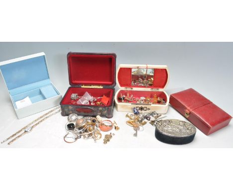 A group of vintage costume jewellery and boxes to include a silver Carvel wrist watch and bracelet (AF, damage to strap) red 