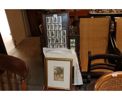 A pair of cottage prints; a pencil sketch; and two framed and glazed Wills cigarette card collections