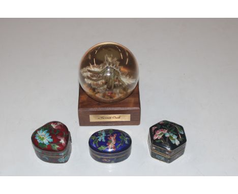 A hermit crab paperweight and three cloisonné decorated boxes and covers 
