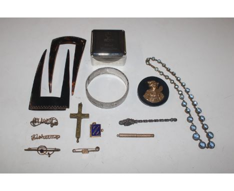 A First Communion box of hair combs, brooches, bangle etc.