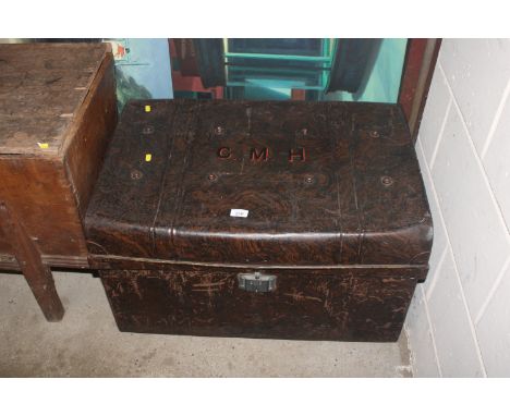 A tin storage trunk