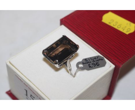A large Hallmarked Sterling silver and smoky quartz ring, size N/O, approx. 7gms 