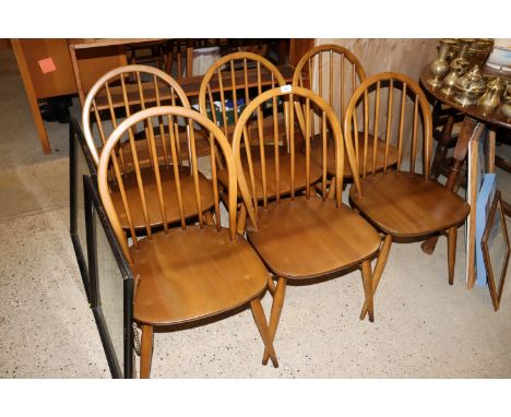 A set of six Ercol Windsor stick back chairs