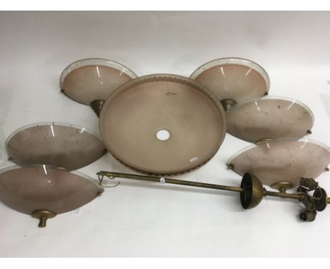 A collection of Art Deco style pink glass light fittings comprising six wall ( 4 and 2 ) and a central with attachment