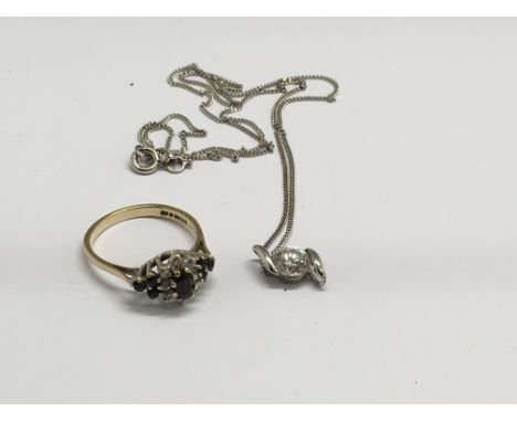A gold sapphire and diamond set ring, approx L/M, and a silver necklace