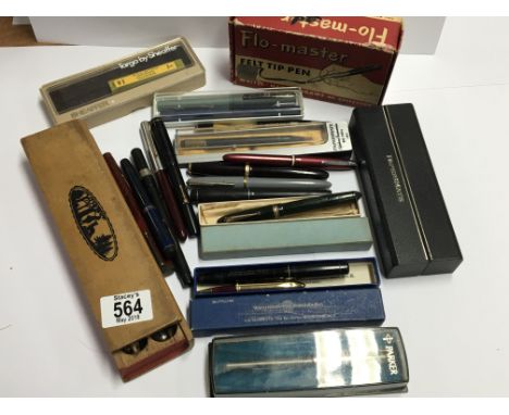 A collection of various vintage fountain pens some in orgional boxes and some accessories.
