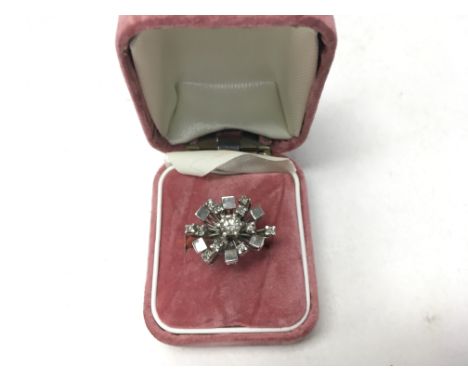 A modern design 18ct gold diamond set ring. Weight approx 5.6g, size approx M.