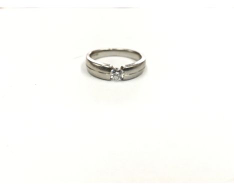 A modern design platinum ladies solitere ring the brilliant cut diamond .4ct. Ring size R.