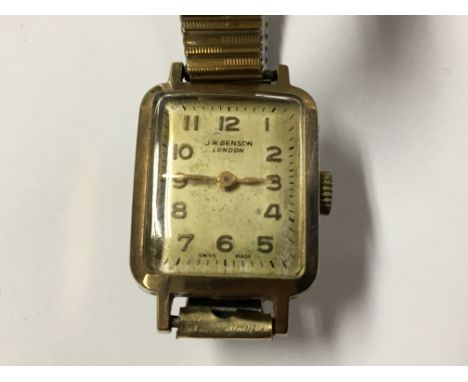 A Vintage Gold cased JW Benson Watch, working order in orgional box with a replacement strap.