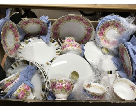 A box containing Royal Albert 'Serena' and Midwinter 'Sienna' pattern teawares