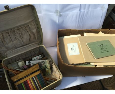 A large collection of art supplies to include paints, sketch books and a mobile cased paint8ng station with a canvas and mixi