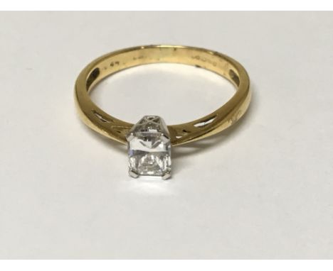 An 18ct yellow gold ring set with an Asscher cut diamond o.4carat approximately. Ring size L.