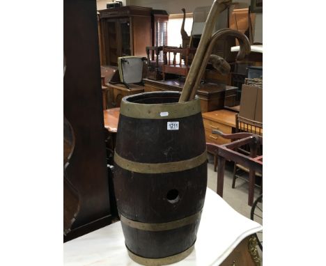 An oak brass bound stick barrel,