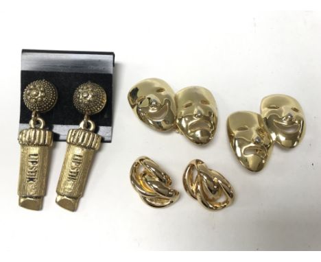 Three pairs of collectible clip on earrings including Butler & Wilson, Christian Dior & Moschino.