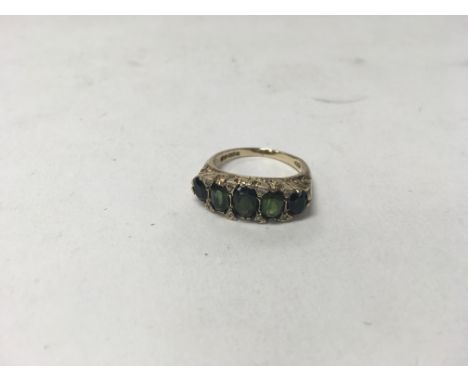 A 9ct gold green garnet ring. Weight approx 6g, size approx O