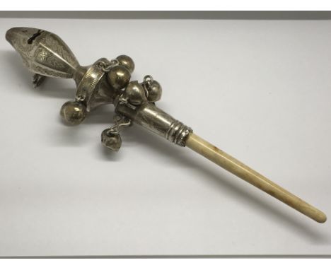 A fine late 19th century baby's rattle of engraved white metal with bone teething stick, marked 'J.A'.Approx 19cm long