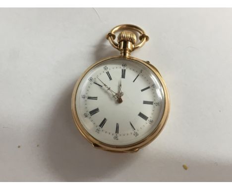 A Quality 14ct Gold Watch with an open face the reverse with an oval enamel inset plaque depicting a young girl playing a har