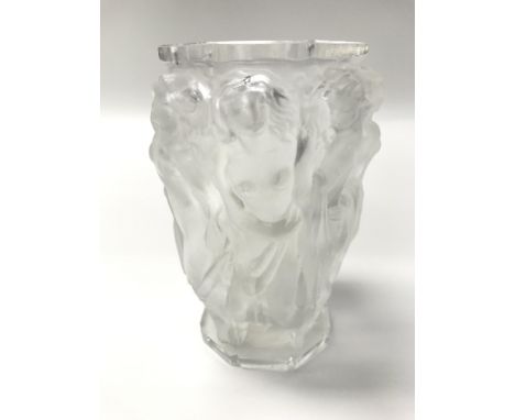 A Lalique vase of nude maidens, signed R. Lalique to base.
