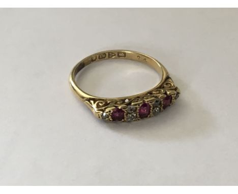 A ruby and diamond ring set in 18ct with hallmarks dated 1927 Chester