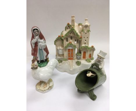 A Staffordshire pastille burner in the form of a building plus three ceramic figures including a cockerel (4).