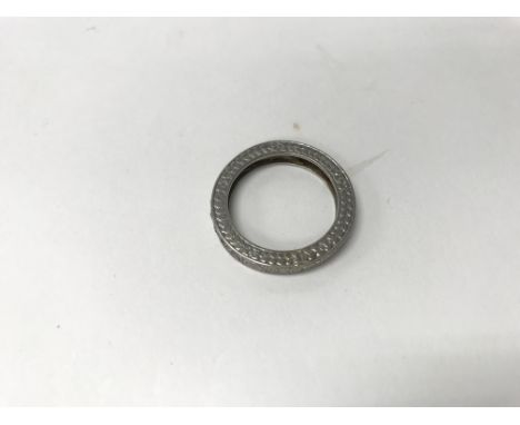 A diamond eternity ring. Weight approx 6.2g, size approx R.