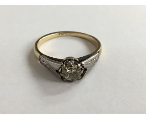 A platinum and Gold Ladies ring set with a solitaire diamond 0.4 of a carat approximately. Ring size O. 