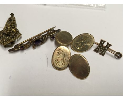 A pair of 9ct Gold cufflinks, a brooch set with amethyst and seed pearl and one other brooch M.