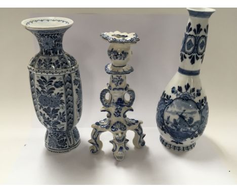Two 20th century Delf vases and a conforming candle stick, some damage.