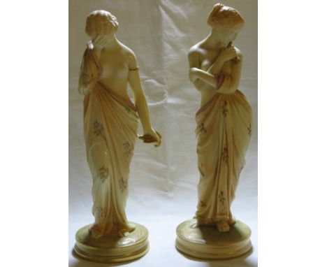 Pair of Royal Worcester figures Joy and Sorrow, modelled as Classically draped women with gilded doves, their robes painted w